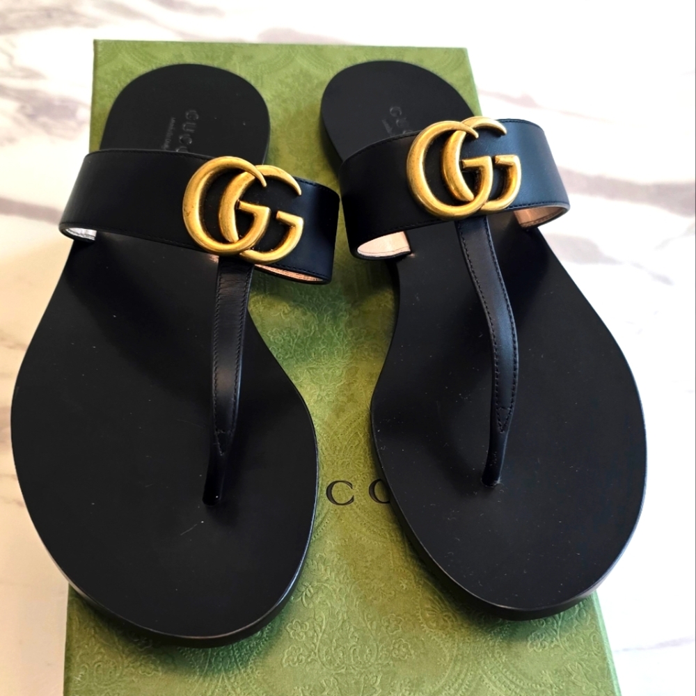 Gucci Women's Sandals in Black with Gold Accents